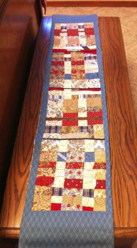 So cool how Tammi cut up, rearranged, and finished her Skinny quilt...