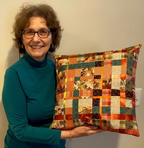 Arlene, thanks for sending me this pic of you  and your fabulous pillow!